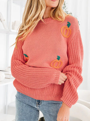 Burnt coral knit sweater with embroidered pumpkins, crew neck, long sleeves.