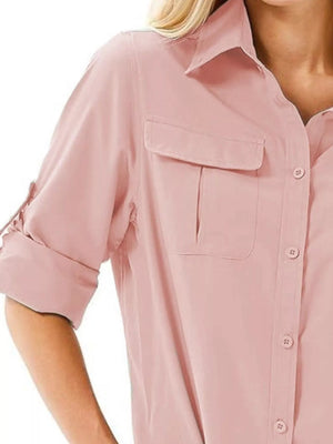 Pink button-up shirt with roll-up sleeves and chest pockets