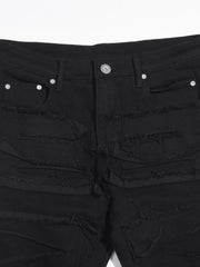 Black denim jeans with layered frayed detailing and a sculpted fit.