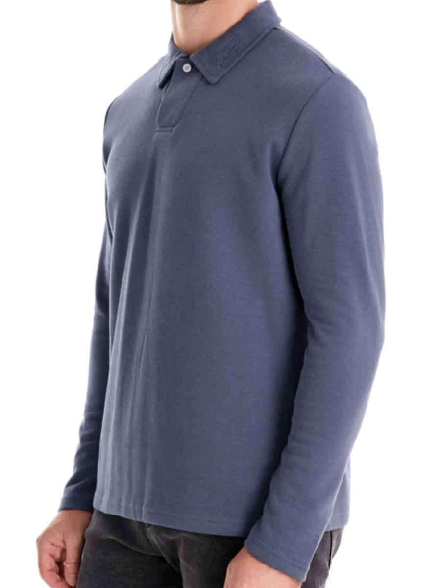 Long sleeve dusty blue polo shirt with collar detail and button placket.
