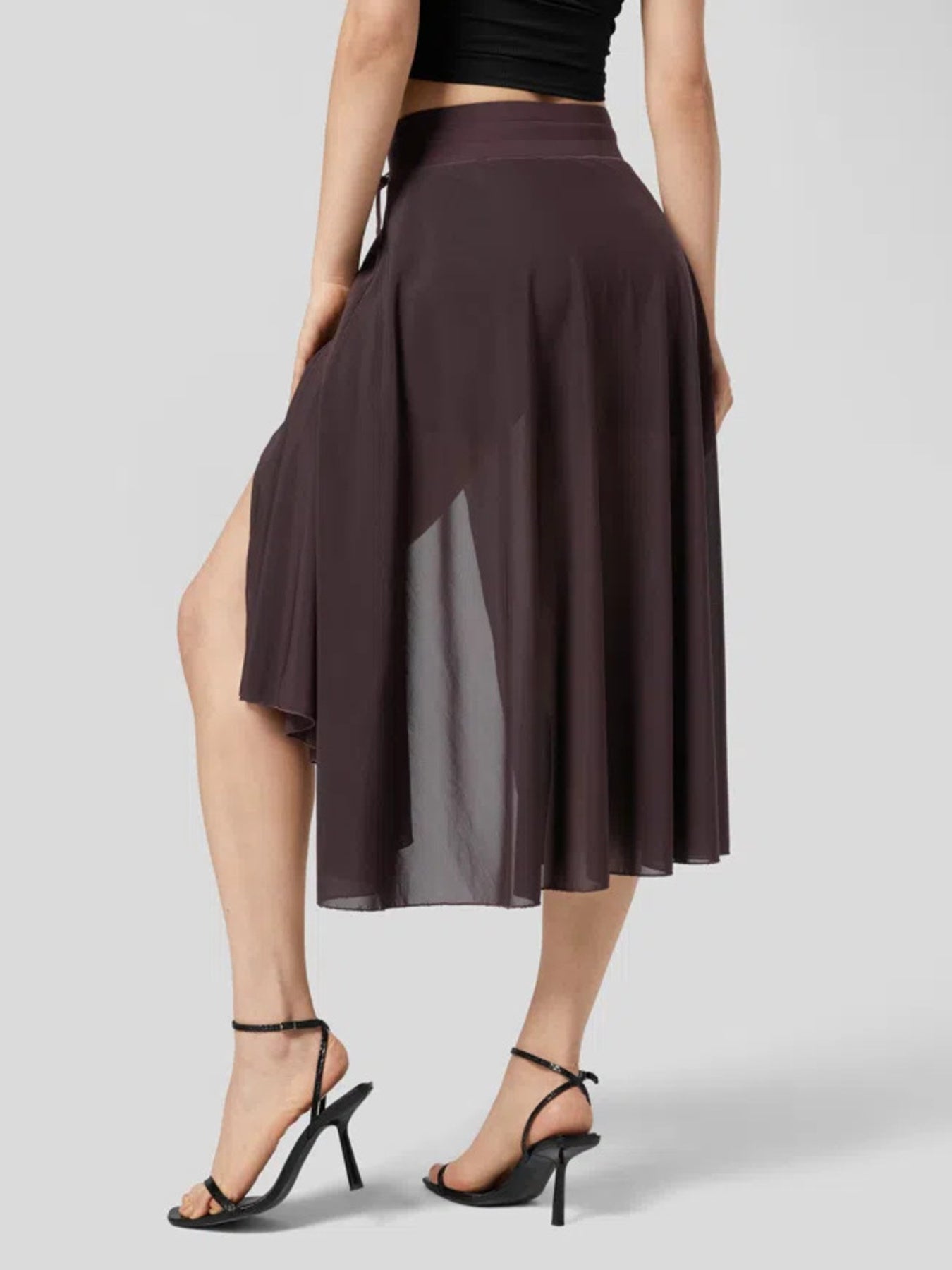 Flowy midi skirt in coffee with a drawstring and shorts liner, featuring a high slit.