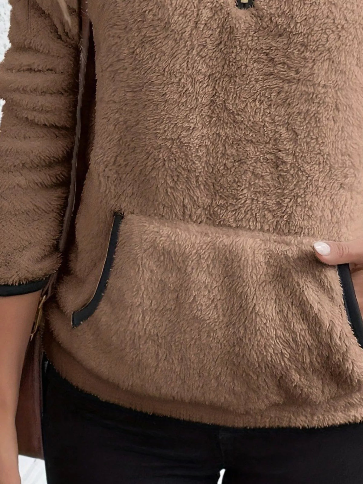 Brown fleece quarter zip pullover with kangaroo pocket and black trim