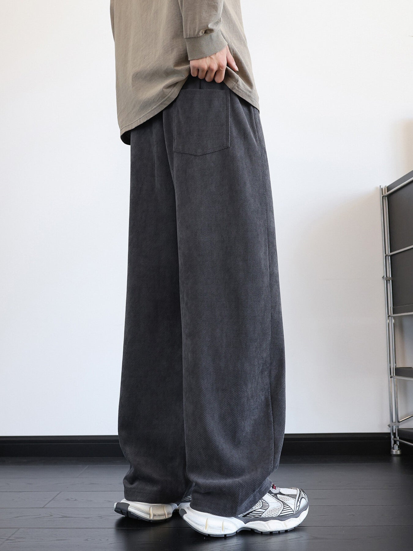 Men's dark gray vintage washed wide leg sweatpants with a back pocket detail.
