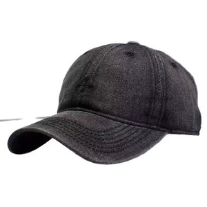Black denim baseball hat with subtle embroidered detail and curved brim.