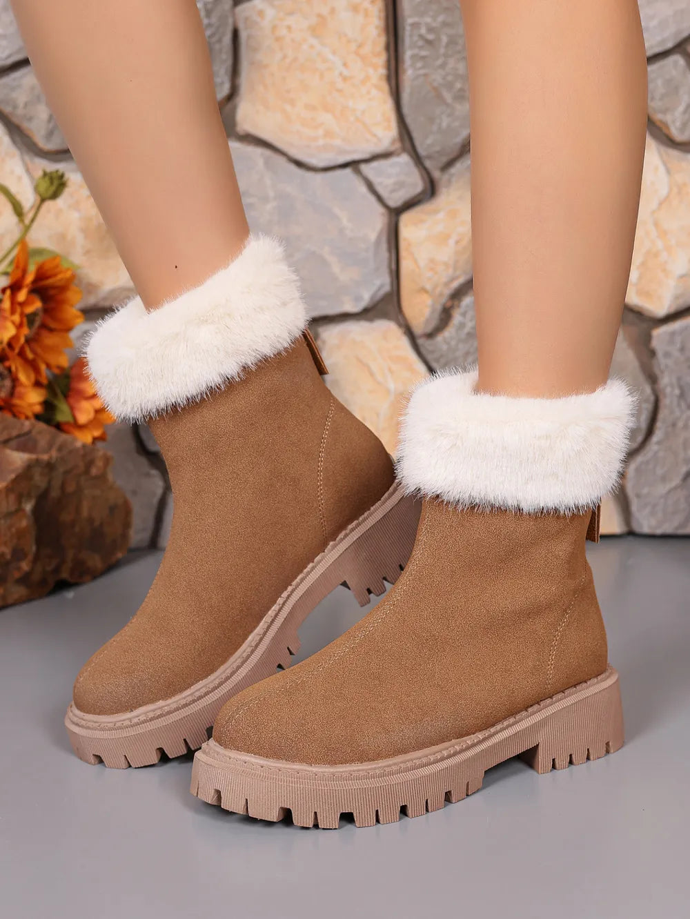 Camel suede ankle boots with white faux fur trim and lug sole.