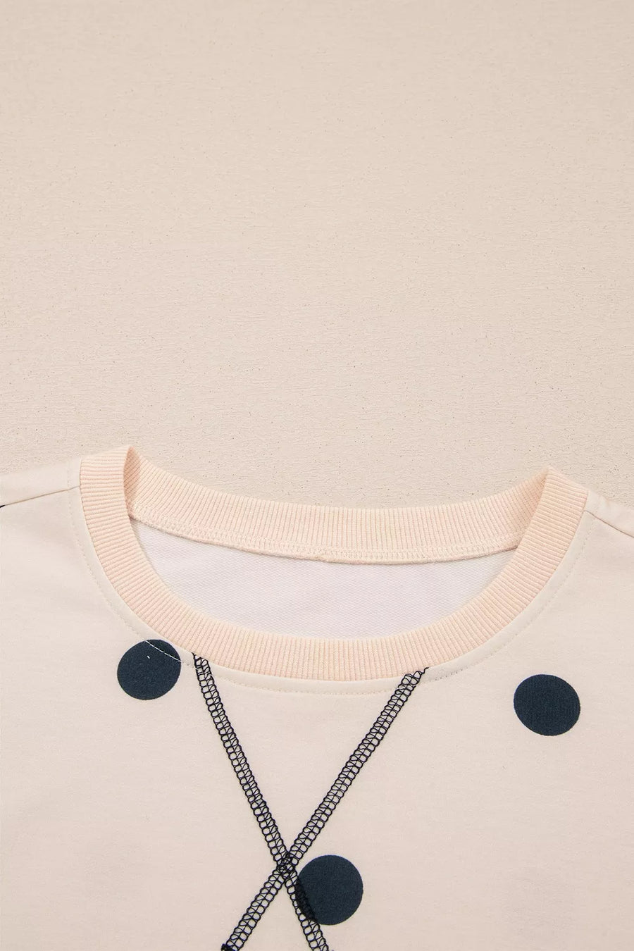 tunic in cream with ribbed cuffs and tunic-length