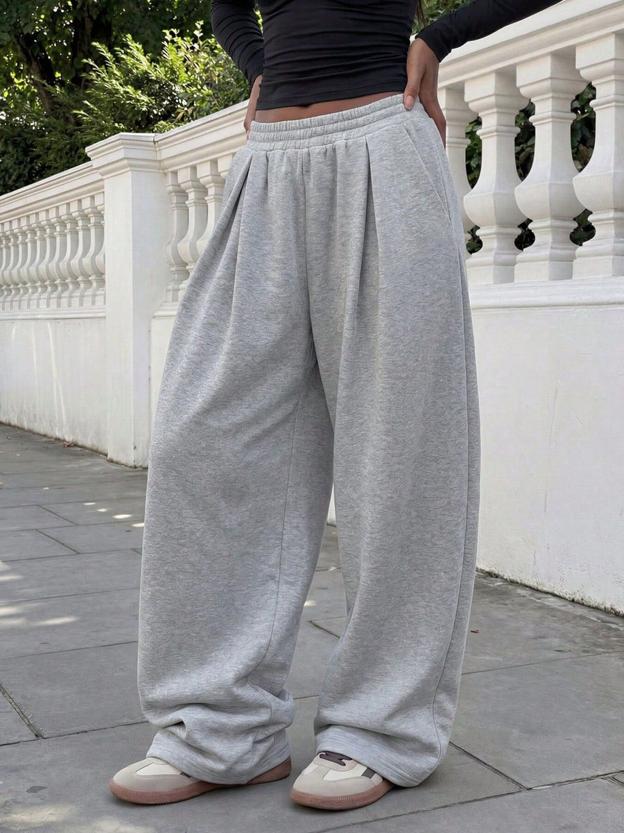 light gray sweatpants with full-length and elastic