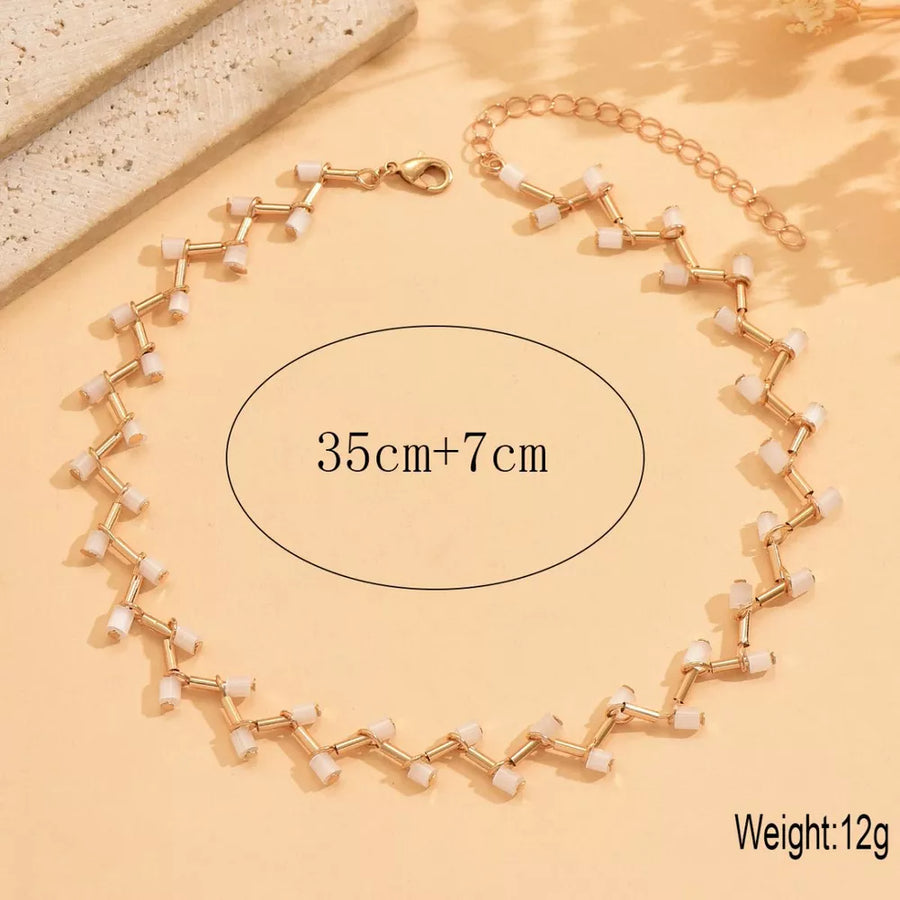 gold necklace with choker and clasp