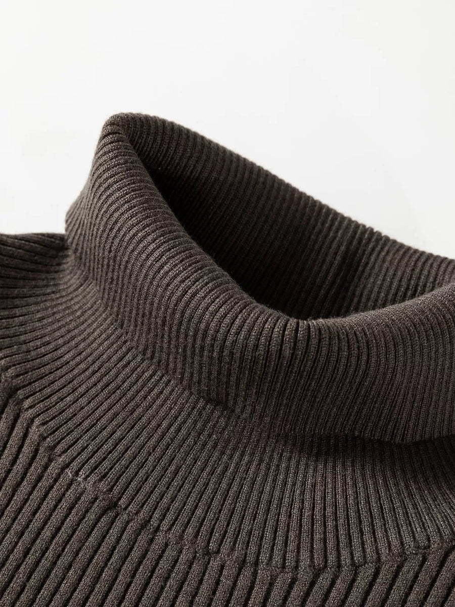 sweater vest featuring ribbed in Coffee Brown with 100% polyester Care instructions: Machine wash cold texture