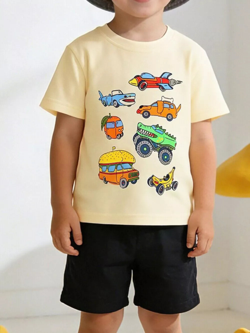 Toddler yellow cotton t-shirt with whimsical vehicle print