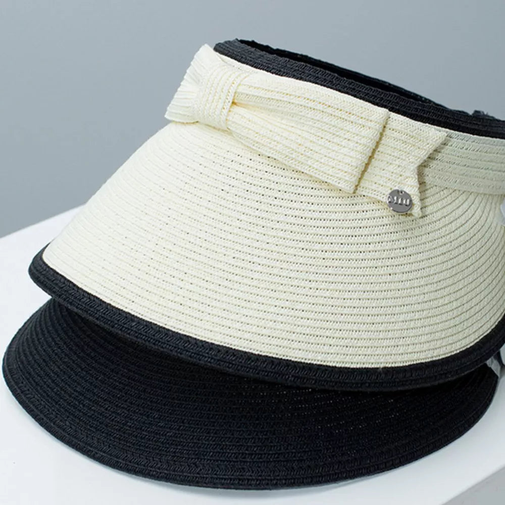 Straw sun visor hat with ivory white bowknot and black trim