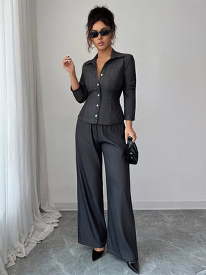 Gray button-up shirt and wide-leg pants set with button details and elastic waist.