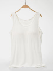 White scoop neck tank top with a relaxed fit.