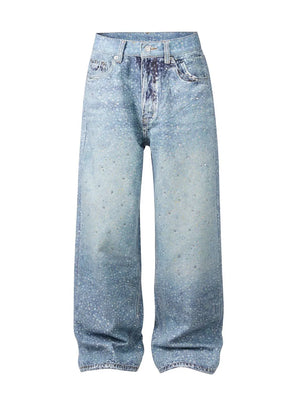 Embellished wide-leg denim trousers in medium wash with allover sparkle details and a faded effect.
