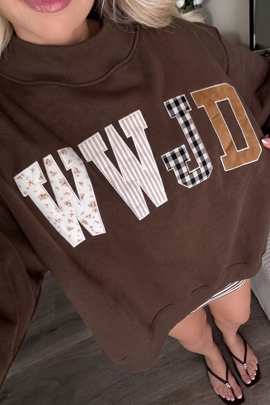 50% polyester, 50% cotton Care instructions: Machine wash cold sweatshirt in black with oversized silhouette