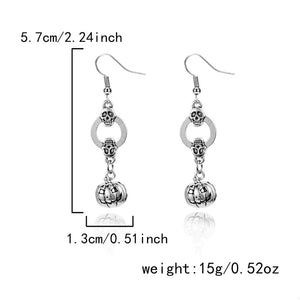 earrings in Silver with novelty and dangle