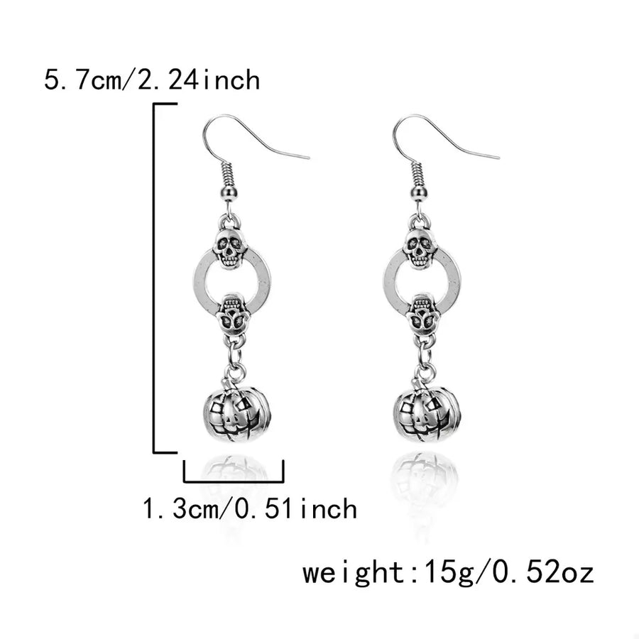earrings in Silver with novelty and dangle