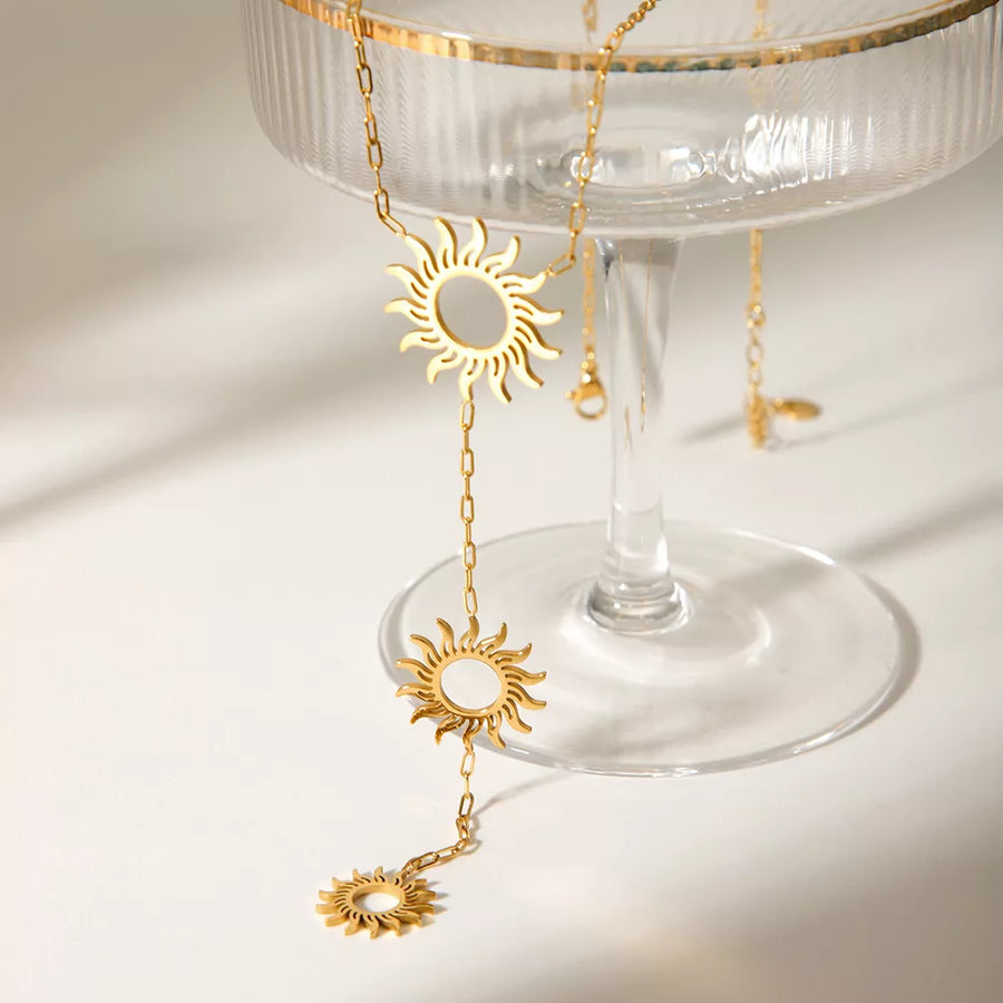 necklace featuring sun motif in gold with 18K Gold-Plated, Stainless Steel, Titanium Steel Care instructions: Avoid wearin