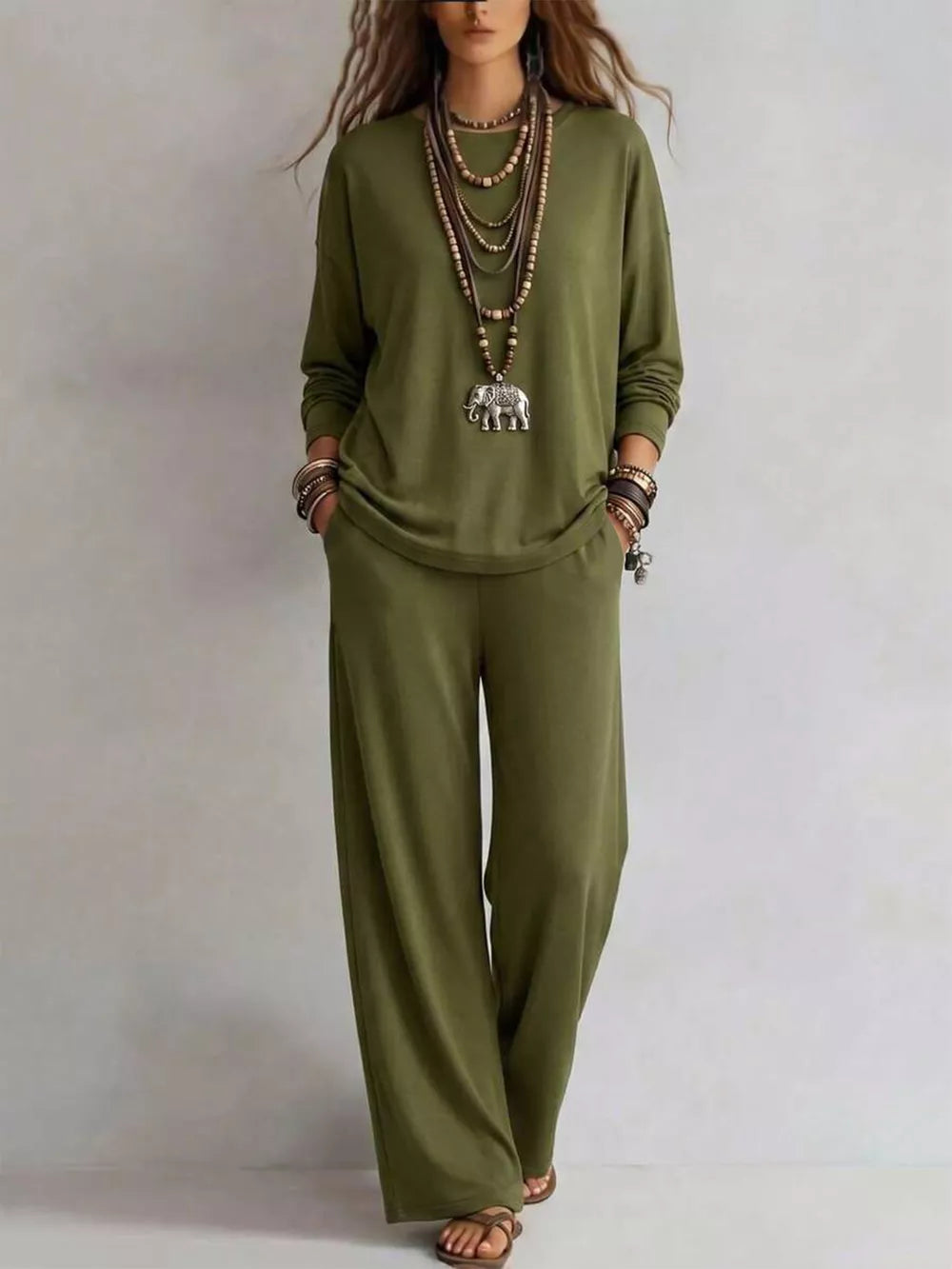 two-piece set in olive green featuring pocketed and relaxed fit