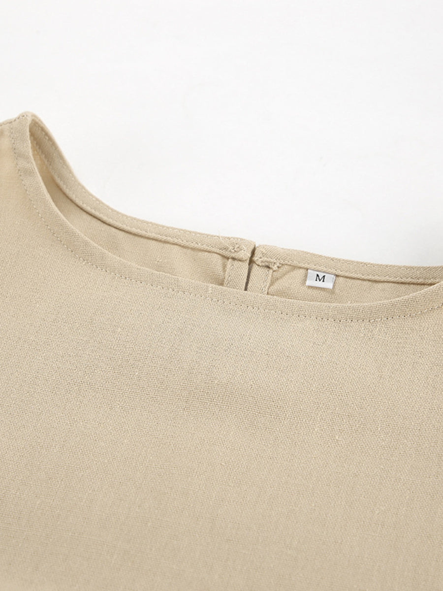 Tan cotton crew neck sleeveless crop top with back closure detail.
