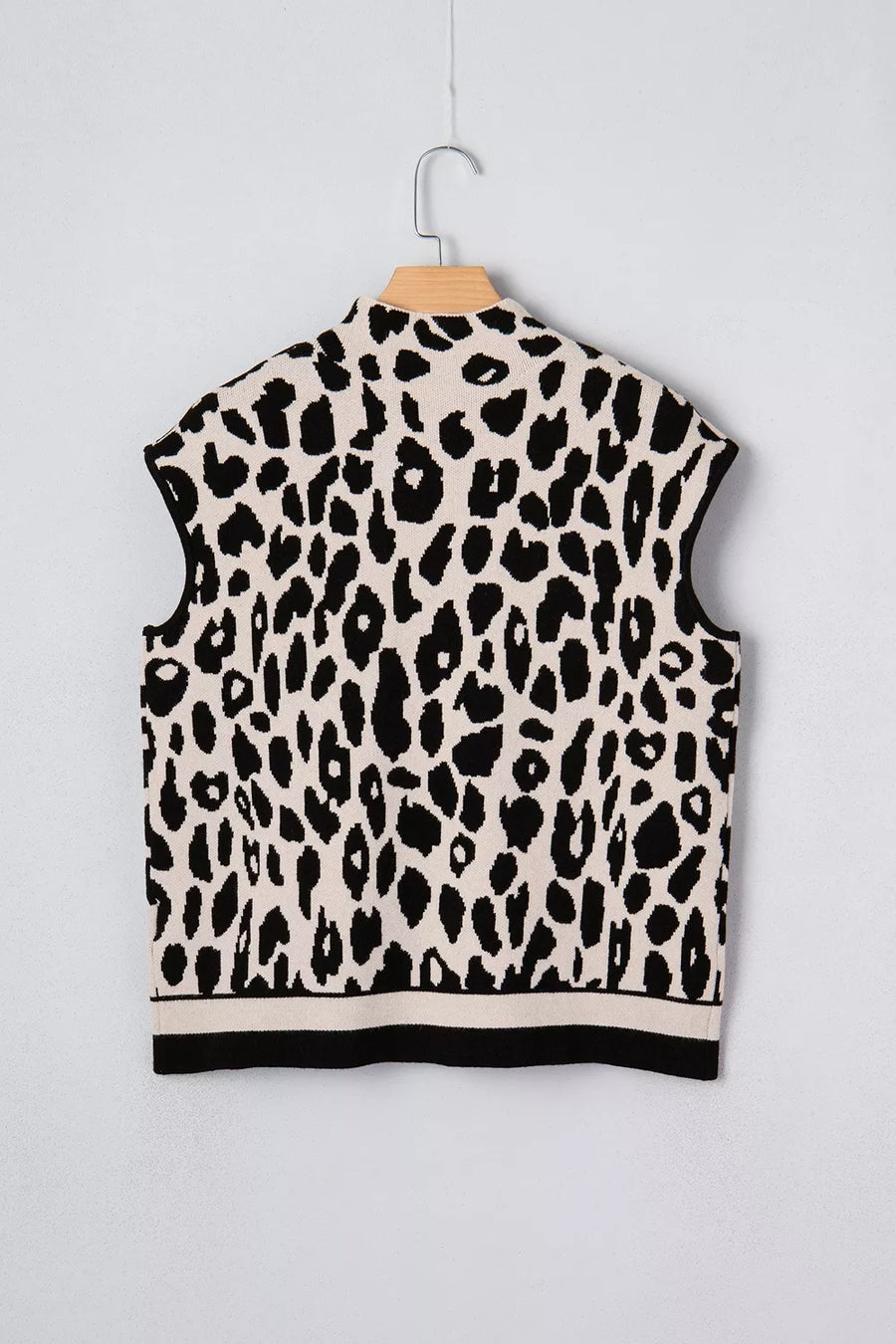 mock neck sweater featuring leopard print in cream with 52% viscose, 26% polyester, 22% polyamide Care instructions: Machine