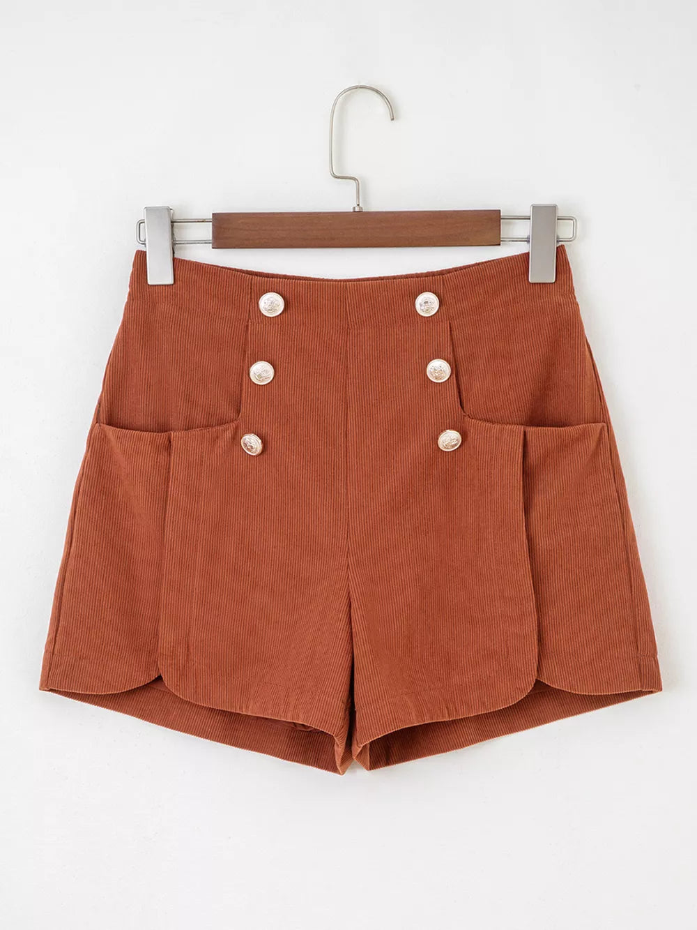 100% polyester Care instructions: Machine wash cold shorts in rust with A-line silhouette