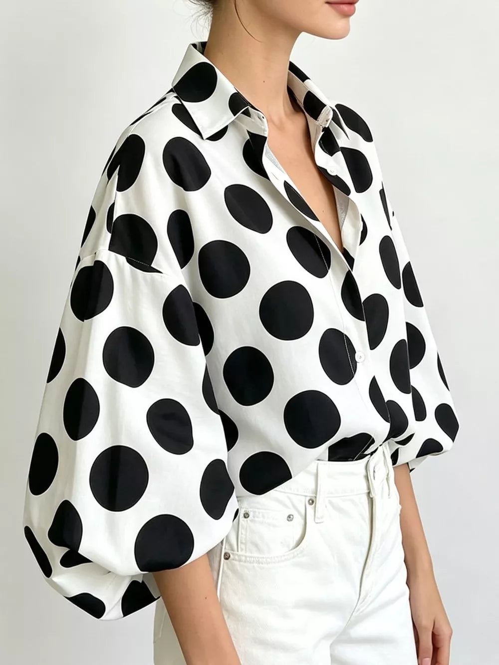 white blouse with hip-length and button-front