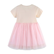 Baby girl's cream short sleeve dress with pink tulle skirt and ruffled waist.