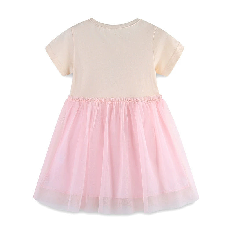 Baby girl's cream short sleeve dress with pink tulle skirt and ruffled waist.