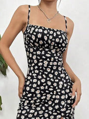 Black flower spaghetti strap midi dress with a floral print and square neckline.