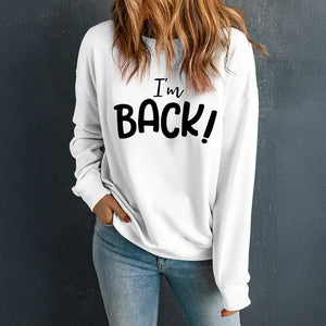 White crewneck sweatshirt with black I'm Back! graphic print