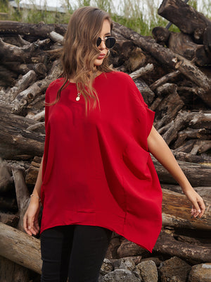 Draped asymmetrical sleeve blouse in White