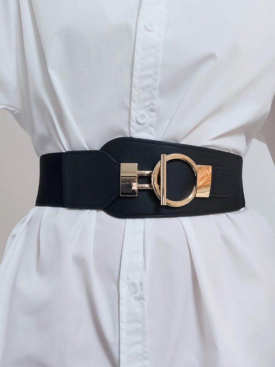 Black elastic belt with sculpted gold buckle and hardware
