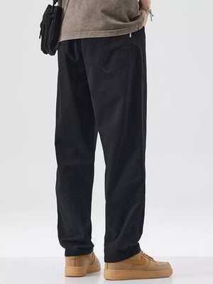 Black relaxed fit cotton pants with a casual style.