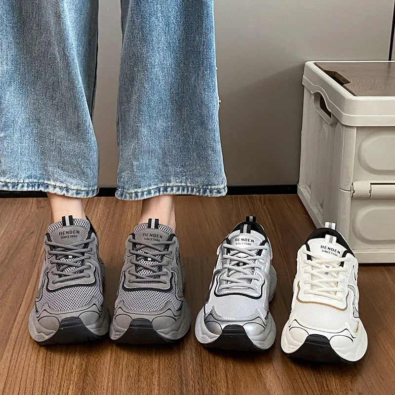 Metallic mesh chunky trainers in dark gray, beige, and silver with breathable athletic style.