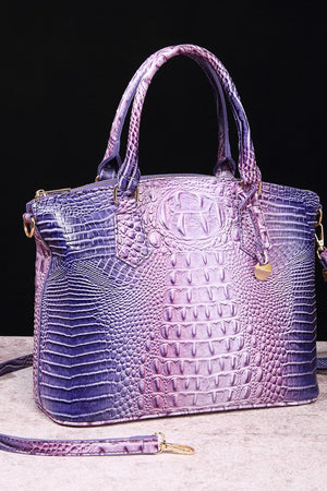 Exotic crocodile satchel bag with purple and pink gradient.