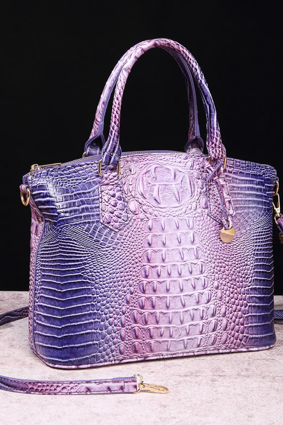 Exotic crocodile satchel bag with purple and pink gradient.
