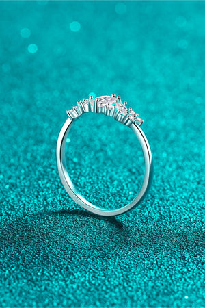 Silver Marquise Cluster Moissanite Ring with sparkling stones.
