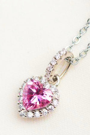 Pink heart halo pendant necklace in 925 sterling silver with clear cubic zirconia accents.
