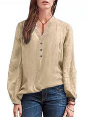 Apricot long-sleeve blouse with V-neck and button detail