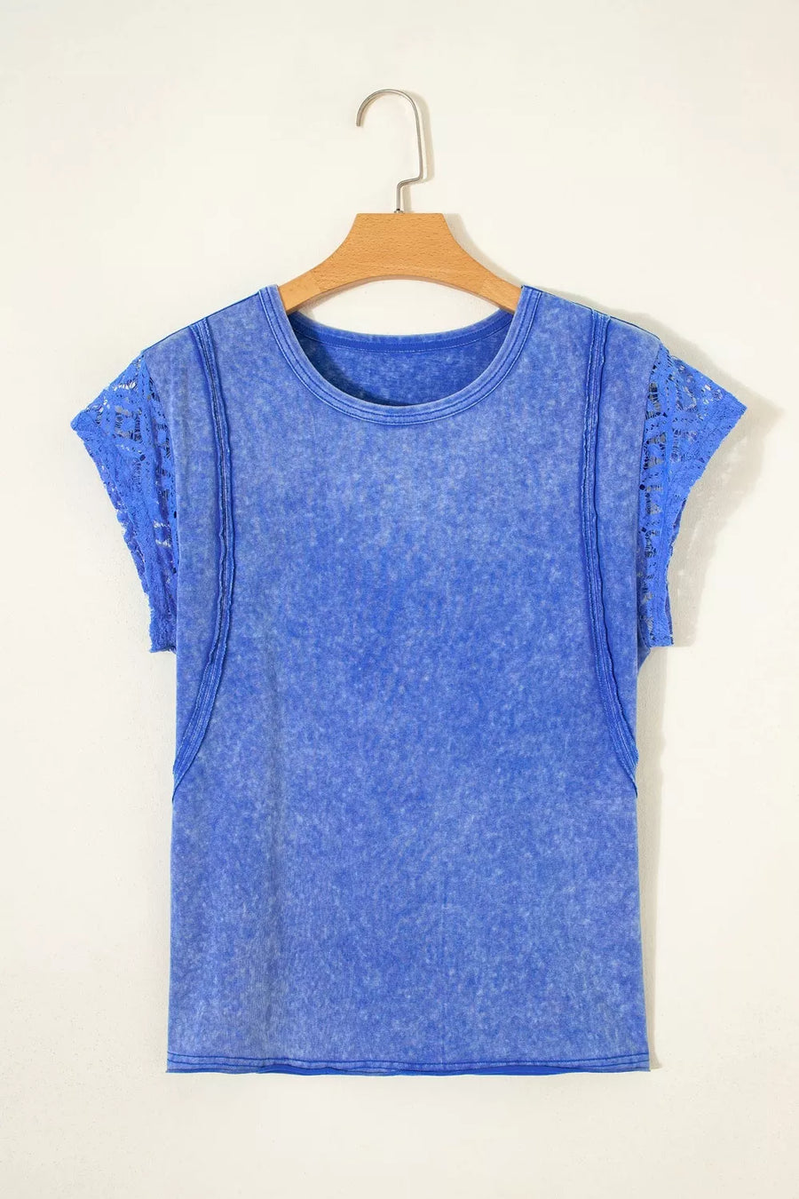 Blue mineral wash cotton tee with distressed look and lace cap sleeves.