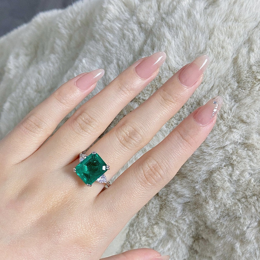 emerald green ring featuring zircon gemstone and geometric