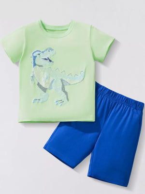 Kids' light green t-shirt with dinosaur applique and blue shorts.
