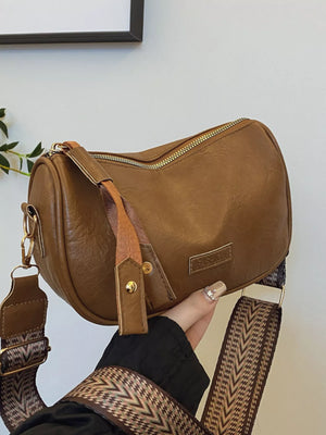 Retro shoulder crossbody bag in coffee brown faux leather with a patterned strap and gold hardware.