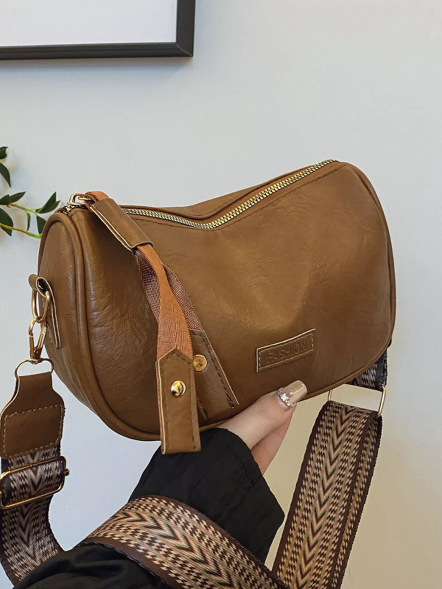 Retro shoulder crossbody bag in coffee brown faux leather with a patterned strap and gold hardware.
