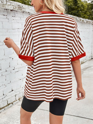 Striped Breton tee in rust and white with red trim.