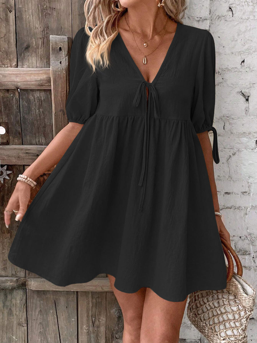 Black tie front puff sleeve mini dress with adjustable sleeve ties