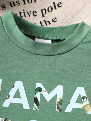 Green cotton blend baby tee with Mama's Boy graphic and duck images.