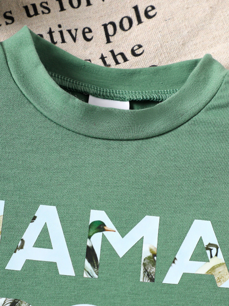 Green cotton blend baby tee with Mama's Boy graphic and duck images.