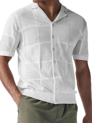 Ivory geometric knit polo shirt with button front and spread collar.